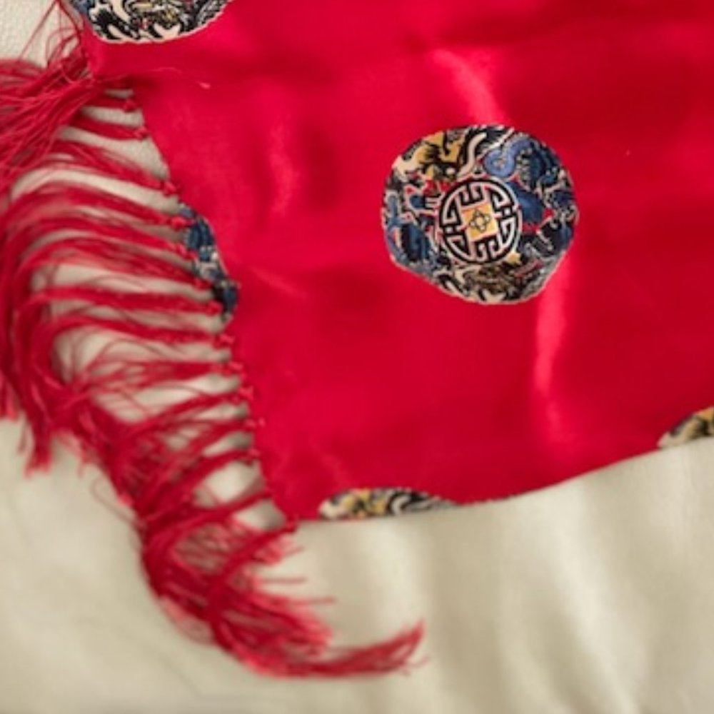 Long red double Chinese silk scarf with tassles.